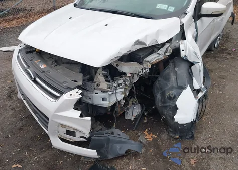 2015 Ford Escape Titanium z USA, uszkodzony, nr VIN 1FMCU9J94FUC39096